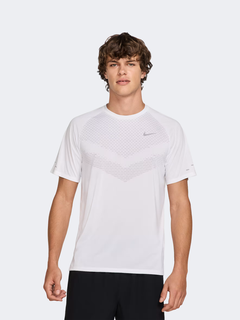silver and white nike shirt