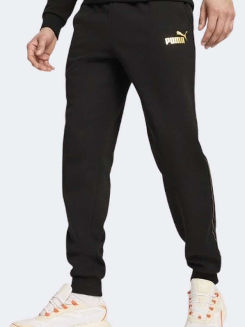 Black and gold puma pants on sale