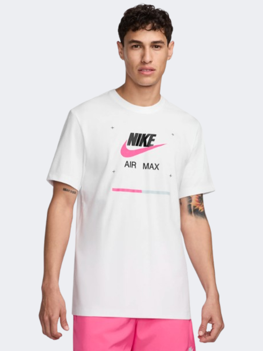 white nike shirt with pink logo