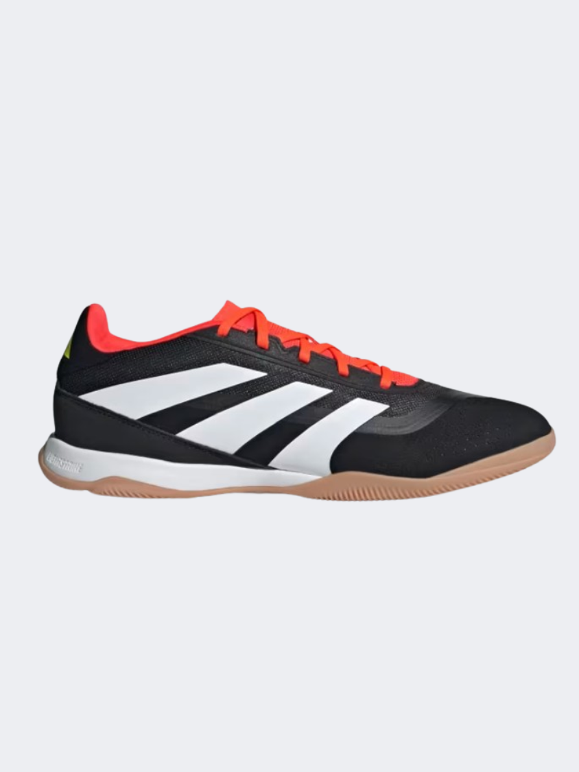 black and red indoor soccer shoes